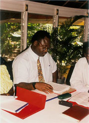Dr. Pino Akota at a developement conference